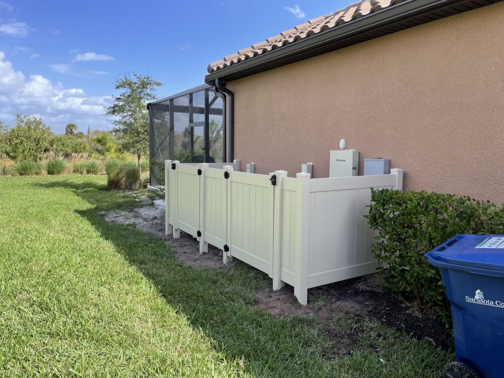 White Vinyl Providing much wanted coverage of mechanical pipes from pool heaters and air conditioners.